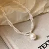 Collar con colgante de cuentas retorcidas de doble capa estilo francés para mujer, nuevo modelo 2026, cadena para la clavícula, accesorio de lujo ligero y de alta gama