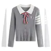 Cárdigan de punto ajustado con cuello polo y pajarita blanca de contraste, estilo universitario primavera 2026, top extremadamente elegante para mujer