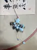 Amuletos para Bolsos de Cerámica Tejidos a Mano con Forma de Fresas, Ballenas, Hongos y Calabazas. Suministro al por mayor para bolsas de vendedores ambulantes