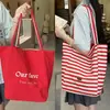 Bolsa Tote de Design de Nicho Feminina 2025 Novo Estilo Popular Versátil Bolsa de Ombro Dupla Face Grande Capacidade Bolsa de Lona para o Dia a Dia