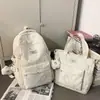 Mochila para Auriculares con Patrón de Estrella Versátil de Nicho Transfronteriza 2026 Mochila Escolar de Gran Capacidad para Estudiantes Universitarias Viajes Mochila con Graffiti