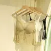 2026 Primavera/Verano encaje finamente tejido sexy delgado copa fija anti-exposición wrap chest sujetador de una pieza