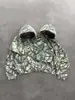 Estilo Novo Europeu e Americano Tendência de Rua Estampa Camuflada Moda Moletom com Capuz Solto Calça de Perna Reta Conjunto de Duas Peças Atacado