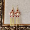Aretes de borla de maquillaje facial Dan de espada de caballo de estilo chino, aretes de cuentas de diseño de temperamento largo nicho nacional de moda para mujer