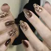 Manicura Portátil de Venta Caliente Transfronteriza Otoño e Invierno Uñas Cortas Almendradas Estampado de Leopardo Ojo de Gato Uñas Portátiles Productos Terminados Venta al por Mayor