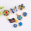 Accesorios de cuentas de mariposa con aceite azul quemado en oro francés antiguo, accesorios de bricolaje, accesorios de oro arena, accesorios para pulseras y collares.
