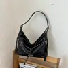 Bolso tote de gran capacidad estilo retro europeo y americano, nuevo modelo 2026, bolso de hombro y cruzado versátil de alta gama para el trabajo