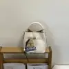 Bolsa de Mão Retrô Transfronteiriça para Mulheres Moda Primavera 2026 Bolsa Saco Design de Nicho Bolsa Transversal para Mulheres Conjunto