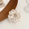 Anillo para el pelo de intestino grueso con cara sonriente de dibujos animados, joyería de tienda de 2 yuanes, accesorios para el cabello coreanos, tocado, simple, color té con leche, cuerda para el pelo de niñas
