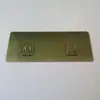 Fabricantes de hebillas de pasta sin costuras accesorios de hebillas de garra sin costuras gancho de parche de estante de acero inoxidable hebilla transparente cepillada