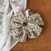 Goma para el pelo vintage de lunares florales para mujer, elegante coletero que hace que la cara parezca más pequeña, suave accesorio para coleta