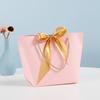 Bolsa de regalo portátil con lazo para hacer ropa, tienda de ropa, bolso de papel, bolsa de compras al por mayor, bolsa de cosméticos
