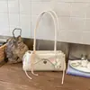 Bolso de mujer coreano de nicho más vendido, bolso de hombro casual versátil, bolso de axila de moda y simple para el día a día, bolso baguette de alta gama