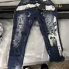 Jeans Masculino Slim Fit Stretch Rasgado com Patchwork, Corte 3D e Estampa Graffiti D2 Tendência Nova Primavera/Verão 2026