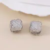 Vintage vintage simple tejido repujado patrón trébol de cuatro hojas hebilla de oreja moda tridimensional diario
