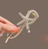Nuevo tocado estrella de mar concha perla pasador para la parte trasera de la cabeza rizador artifacto para el cabello clip de torsión aleación pedrería accesorios para el cabello al por mayor