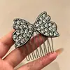 Nuevo peine anti-deslizante estilo coreano con un delicado lazo de mariposa, diseñado para mujeres, creando un peinado alto elegante, y con un elegante pasador lateral y accesorio para el cabello