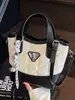 Bolso de cubo de mano de moda transfronterizo, nuevo estilo verano 2026, versátil y elegante, bolso de hombro y bandolera de alta gama de moda