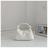 Bolso bandolera de diseño de nicho de alta gama para mujer, bolso de mano elegante y versátil, nuevo bolso casual de un solo hombro para el día a día 2026