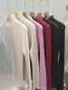 Camiseta básica de cuello alto a medio tono de tres colores, nueva de otoño para mujer, suéter pullover de punto de manga larga a la moda, versátil, con borde de encaje y flores
