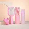 Set de Herramientas de Peluquería Transfronterizo de Cuatro Piezas: Peine de Masaje Hueco, Cepillo de Champú de Silicona, Peine para Teñir el Cabello, Juego de Botellas con Atomizador de Alta Presión