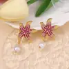 Moda transfronteriza estilo náutico tendencia de diamantes estrella de mar colorida pendiente de imitación de perla pendientes de estilo vacacional en la playa
