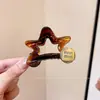 Clip de Pinza de Cola de Caballo Alta Estrella de Cinco Puntas Etiqueta Dorada para Mujer Clip de Tiburón de Alta Calidad Estilo Nuevo 2025 Pinza para el Cabello Accesorios para el Cabello