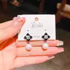 Pendientes de Flor de Perla con Aguja de Plata 925 Moda Nueva 2025 Elegantes con Estilo Exquisitos de Gama Alta Pendientes Pendientes