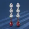 Joia Huabi nova para outono e inverno, cobre banhado a ouro, corindo vermelho simulado, cristal azul, separação de cor ouro preto, pedra de brinco 6*9