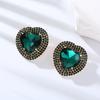 Pendientes exagerados europeos y americanos, pendientes de aleación con forma de corazón de diamantes transfronterizos, pendientes de cadena de garra elegantes con diamantes superbrillantes para mujer de moda.