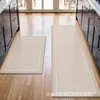 Tapete de Piso para Cozinha, Absorvente de Água, Antiderrapante, Resistente a Manchas, Conjunto de Duas Peças Longas, Tapete de Pé, Tapete de Piso de Terra de Diatomáceas Moderno Simples Transfronteiriço