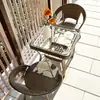Juego de tres sillas de mimbre, incluyendo una pequeña mesa y sillas de balcón, una mesita de té pequeña, una mesa de té de ocio para patio exterior minimalista, resistente al agua y al sol, un diseño popular