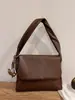 Bolsa Tiracolo de Grande Capacidade Nova Moda Outono/Inverno 2025 Fecho Couro Casual Transversal Simples para o Dia a Dia Bolsinha de Axila