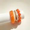 El más vendido en Europa y América, pulsera de resina degradada, pulsera de cuentas metálicas en capas, juego de tres piezas con accesorios de diseño único