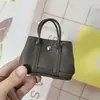 Nuevo Colgante de Mini Bolsa de Jardín Marca H Lindo Accesorio de Bolsa para Auriculares Cadena de Bolsa para Labiales de Microfibra Canasta de Verduras para Mujeres