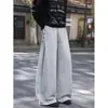 Pantalones de chándal elegantes de pierna ancha para hombre, perfectos para otoño e invierno, con un diseño de alta calle americano, un corte relajado y un estilo moderno, holgado y deportivo.