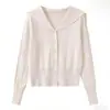 Cardigan de punto de manga larga a la moda estilo francés con cuello azul marino para mujer, primavera 2026, simple y versátil, suéter ajustado y adelgazante