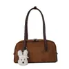 Bolso tipo baguette retro 2026 nuevo bolso simple tipo almohada bolso cruzado para debajo del brazo moda femenina casual versátil bolso de hombro