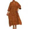 Moda femenina transfronteriza europea y americana 2026: elegante y casual, cuello mao, estampado, mangas acampanadas, tres cuartos de longitud, vestido largo de corte holgado
