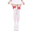 Calcetines de terciopelo hasta la rodilla más vendidos transfronterizos con un lazo rojo, temática de Halloween, seductores, estilo JK japonés, femeninos y resistentes a enganches