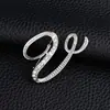 Temperamento de comercio exterior europeo y americano 26 broches de letras inglesas femenina diamante personalidad Joker moda corsage pin masculino accesorios
