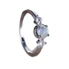 Moda transfronteriza AliExpress para ir al trabajo Palladium Blanco K redondo ópalo blanco anillo simple suministro de fábrica una pieza venta al por mayor