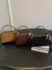 Bolsa de Mão Retrô para Comércio Exterior Pequena Bolsa Feminina 2026 Nova Moda Versátil Bolsa Casual Design de Nicho Bolsa de Ombro Único Transversal