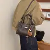 Bolsa Balde Água Mãe e Filho Baozi Feminina 2026 Novo Estilo de Alta Qualidade Versátil Ombro Único Transversal Bolsa Tote para o Dia a Dia