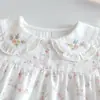 Camisa Floral Estilo Coreano para Niñas 2026 Otoño Nueva Llegada Bebé Niña Dulce Bordado Cuello de Muñeca Camisa Top Lindo