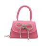 Bolso texturizado de moda de nicho estilo francés para mujer, nuevo modelo Primavera 2026, bolso cuadrado pequeño con lazo, elegante bolso de hombro y cruzado
