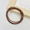 Elástico de Borracha de Alta Elasticidade Prendedor de Cabelo Simples Versátil Anel Básico para Rabos de Cavalo Coques Não Danifica o Cabelo Prendedor de Cabelo com Cobertura de Borracha Feminino