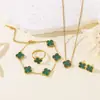 Pulsera, Pendientes, Anillo de Trébol de Cuatro Hojas de Nácar de Doble Cara de 13 mm de Venta Caliente Transfronteriza, Juego de Cuatro Piezas al por Mayor desde el Fabricante