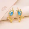Pendientes transfronterizos de moda: Aretes de tulipán con una estética vintage y fresca, con delicados diseños de flor de tulipán, material de cobre y circonita cúbica microincrustada