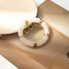Moda Europea y Americana Personalizado Nuevo Pulsera de Codo de Acrílico Tubo de Bambú Curvado Pulsera Multicolores con Patrón de Mármol Retro